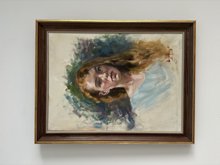 Porträtt i röd ram